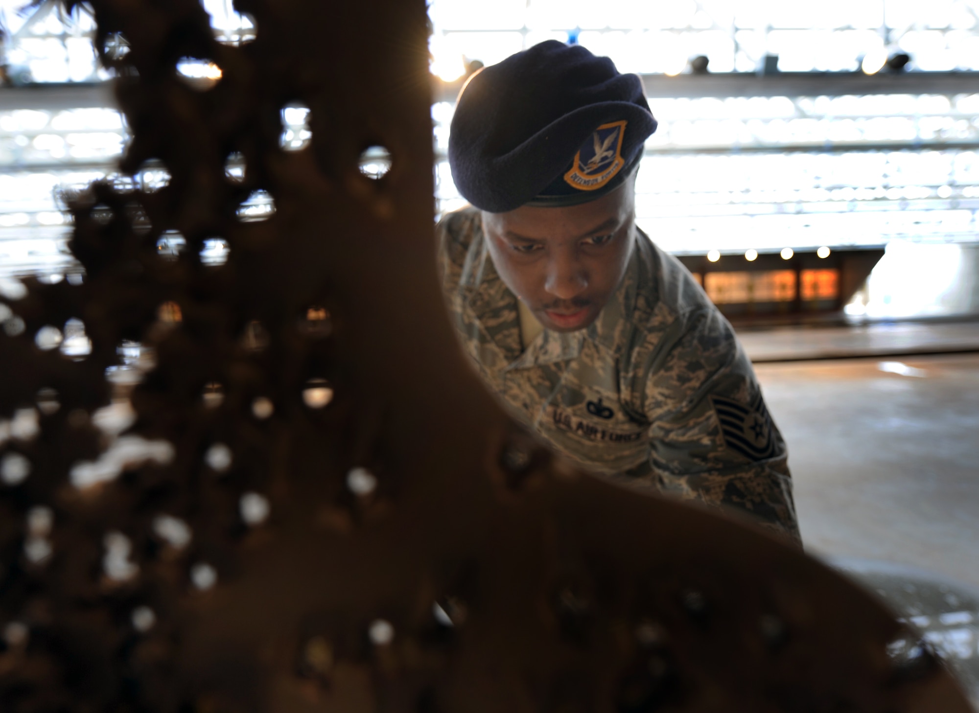 Tech. Sgt. Stephen Boyd, Eighth Air Force non-commissioned officer in charge of security operations, scores a target sheet during the security forces portion of Giant Sword II here, Feb. 19. Sergeant Boyd evaluated the 28th Bomb Wing along with four other participating bomber bases including the 2nd Bomb Wing at Barksdale Air Force Base, La., the 5th Bomb Wing at Minot AFB, N.D., the 7th Bomb Wing at Dyess AFB, Texas, and the 509th Bomb Wing at Whiteman AFB, Mo., in areas such as weapon firing, physical fitness and job knowledge. (U.S. Air Force photo/Airman 1st Class Adam Grant)