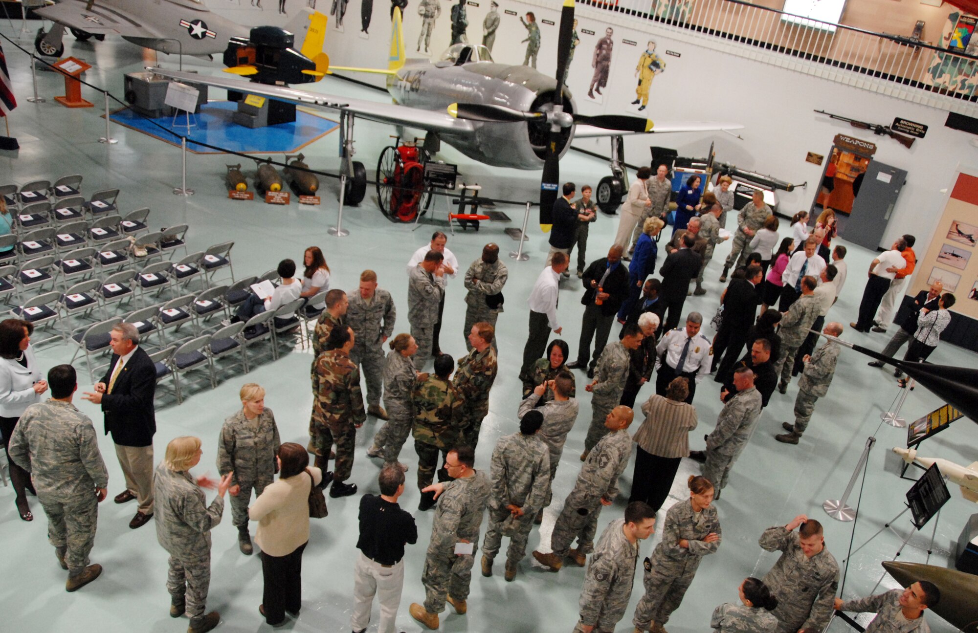 Outgoing and incoming honorary squadron commanders from the 96th Air Base Wing meet and greet their new counterparts before the change of command ceremony Feb. 18 at the Air Armament Museum.  The honorary commanders program gives members of the local community a unique opportunity to interact with and learn about Eglin’s Airmen, their mission and the role they play in supporting the Air Force. In turn, honoraries may invite commanders to community functions, building and maintaining positive relationships between the military and local communities.  Air Force photo/Samuel King Jr.  