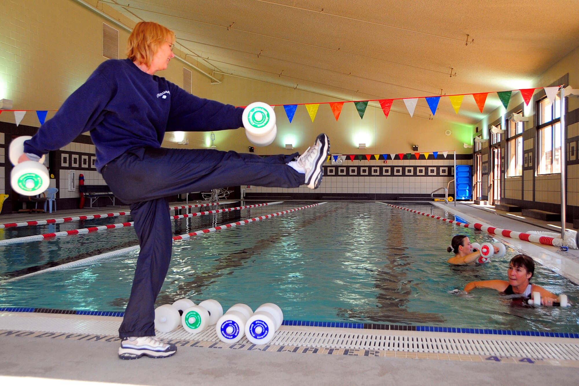 Kathe Peel, 49th Force Support Squadron Fitness and Sports center aquatics director, teaches a water aerobics class during the Holloman Air Force Base, N.M., Fitness and Sports center Open House Feb. 20. (U.S. Air Force Photo/Tech. Sgt. Chris Flahive)