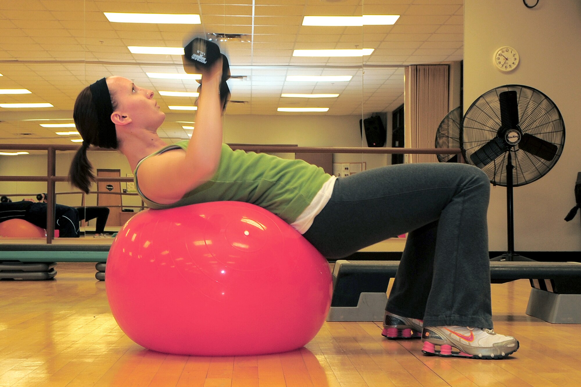 Heather Miller, wife of 1st Lt. Ronald Miller, 49th Force Support Squadron, participates in Circuit Training Orientation during the Holloman Air Force Base, N.M., Fitness and Sports center Open House Feb. 20. (U.S. Air Force Photo/Tech. Sgt. Chris Flahive)
