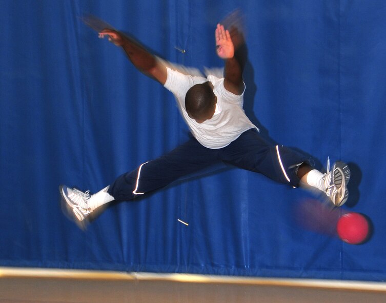 Senior Airman Joshua Kena, 49th Force Support Squadron, dodges a ball during the Holloman Air Force Base, N.M., Fitness and Sports Center Open House dodgeball tournament Feb. 20. (U.S. Air Force Photo/Tech. Sgt. Chris Flahive)