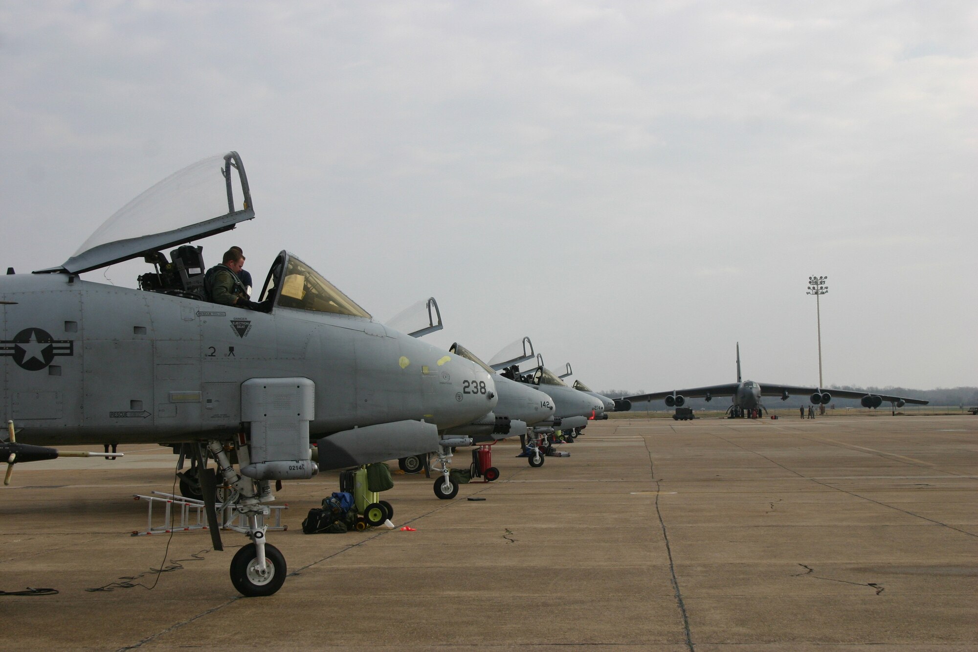 A-10 fighter pilots from the 354th Fighter Squadron conduct pre-flight checks before their first CAS mission during GFE rotation 09-04 at Barksdale AFB, La.  (JFIIT photo/Casey Bain)