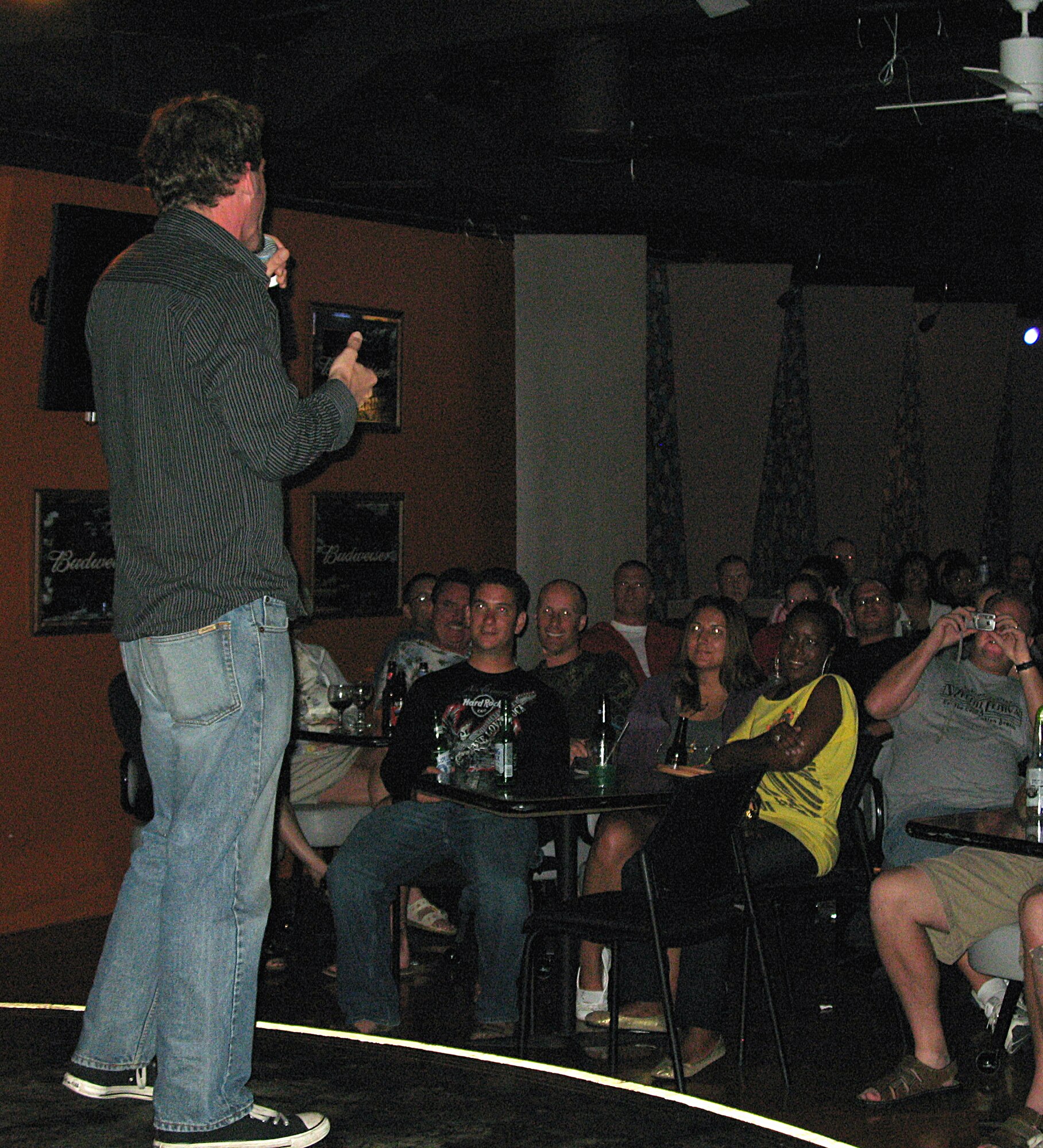 ANDERSEN AIR FORCE BASE, Guam -- Comedian Sean Ottey performs his act for a full house at Hightides Lounge Feb. 21 here. The Comedy show had approximately 150 Team Andersen members in attendance. (U.S. Air Force photo by Airman 1st Class Carissa Wolff)