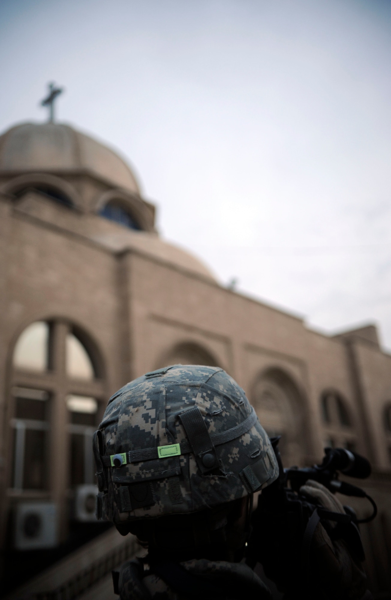 Tech. Sgt. Adrienne Brammer, 1st Combat Camera Squadron combat videographer from Charleston Air Force Base, S.C., documents Army Soldiers conducting a patrol in Mosul, Iraq, Oct. 21. (U.S. Air Force photo by Staff Sgt. JoAnn S. Makinano)