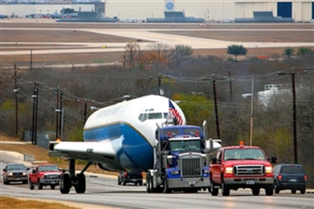The Speckled Trout, a Boeing KC-135, is towed to its new home on Lackland Air Force Base, Texas, Feb. 15, 2009. The aircarft arrived at Lackland in June 2008 and was converted into a trainer for aircrews, including refueling boom operators, loadmasters, flight attendants and airborne missions systems specialists.