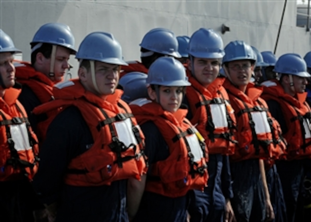 U.S. Navy sailors from the deck department aboard the amphibious command ship USS Blue Ridge (LCC 19) stand by to come along side Military Sealift Command supply ship USNS Pecos (T-AO 197) to rig tension and shot lines while taking on fuel and supplies during an underway replenishment in the Pacific Ocean on Feb. 17, 2009.  The Blue Ridge is the flagship for Commander, U.S. 7th Fleet.  