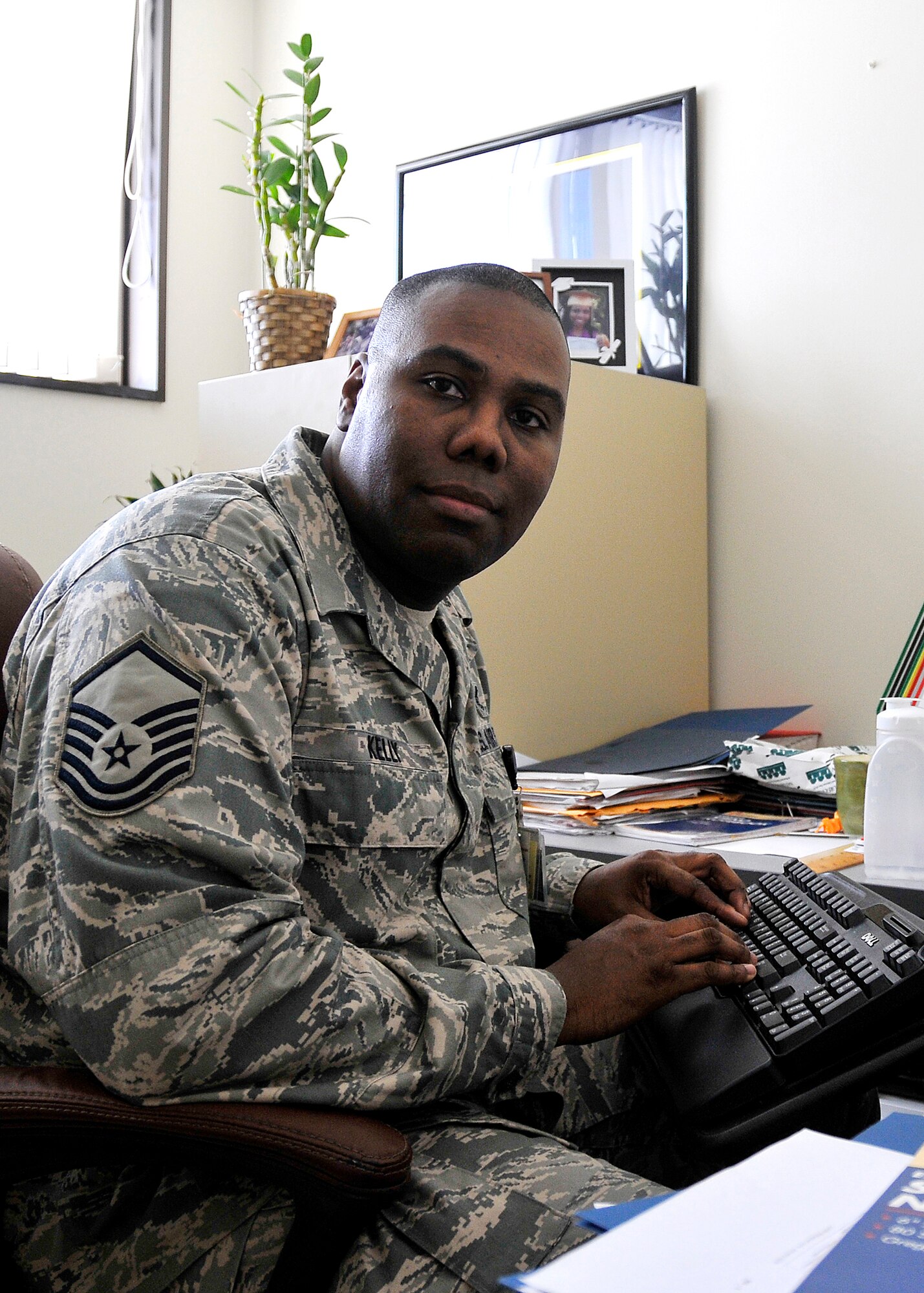 MISAWA AIR BASE, Japan -- Master Sgt. Stefan Kelly, 35th Medical Support Squadron TRICARE operations and patient administration flight chief, works at his computer Feb. 19, 2009.  Sergeant Kelly joined the Air Force in 1987 and is the 2008 Air Force Health Plan Management Senior NCO of the year. (U.S. Air Force photo by Senior Airman Chad Strohmeyer)