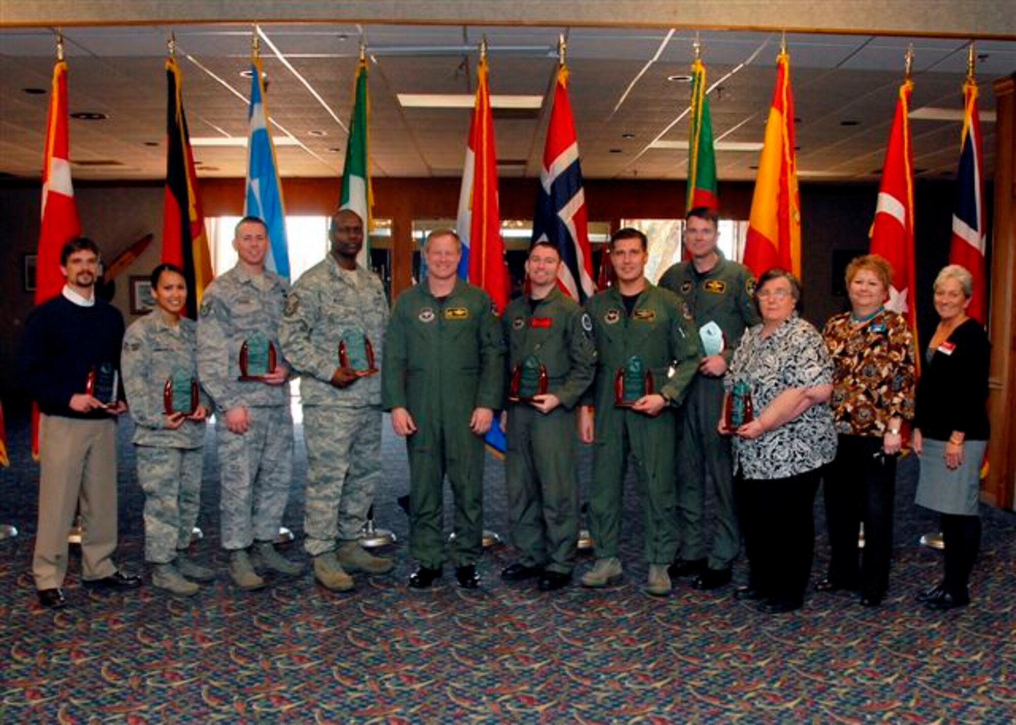 80th Flying Training Wing quarterly award winners for the 2009 fisrt quarter show off their awards Feb. 19 with 80th FTW Commander  Col. David Petersen and 80th FTW Superintendant Chief Master Sgt. Norman Thierolf at the wing's quarterly award luncheon. (U.S. Air Force photo)