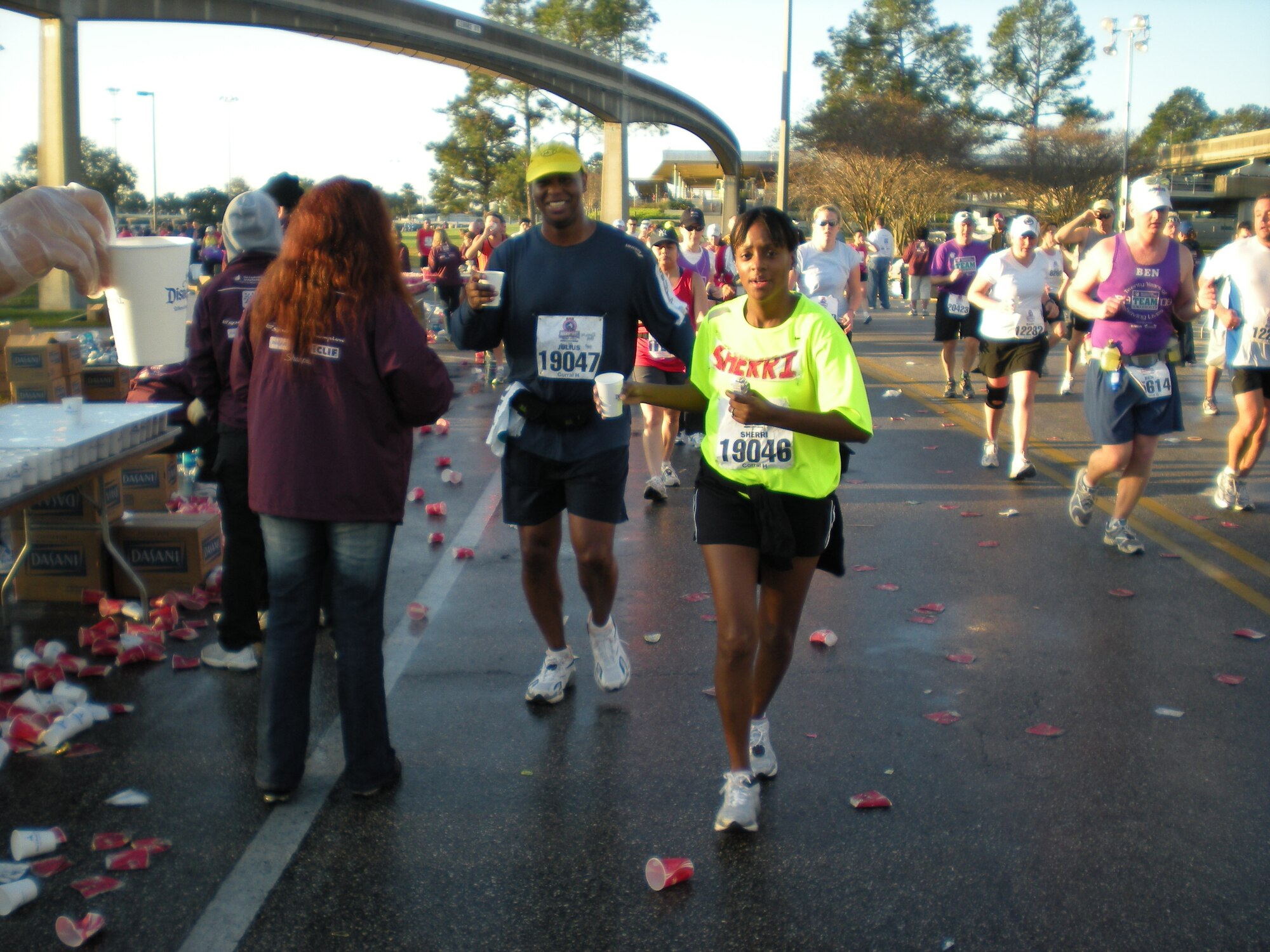 HURLBURT FIELD, Fla. -- Tech. Sgts. Sheri Rodden and Julius Parker, both 1st Special Operations Wing Safety, participate in the Walt Disney World Marathon, Jan. 11. The marathon was the first for both runners who accepted a challenge from their commander to become more fit to fight. (U.S. Air Force courtesy photo)                               