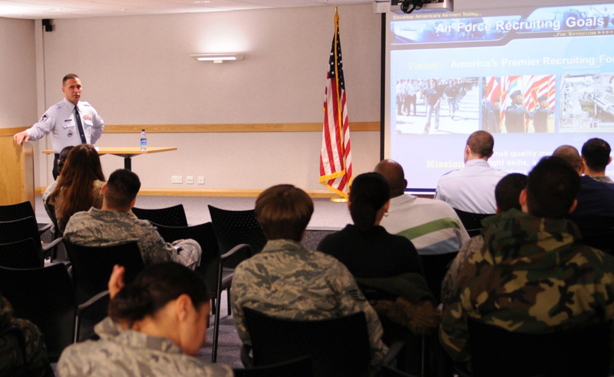 Master Sgt. Craig Ploessl, Recruit Screening Team NCOIC, from Randolph Air Force Base, Texas, briefs Team Mildenhall Airmen on the details involved in special duty assignments for Air Force military training instructors and recruiters, at Building 809, Feb. 19, 2009, at RAF Mildenhall, England.  Sergeant Ploessl and his team spent the morning explaining the benefits such as career progression and college credits, while also answering questions and concerns for the Airmen. (U.S. Air Force photo by Staff Sgt. Jerry Fleshman) 