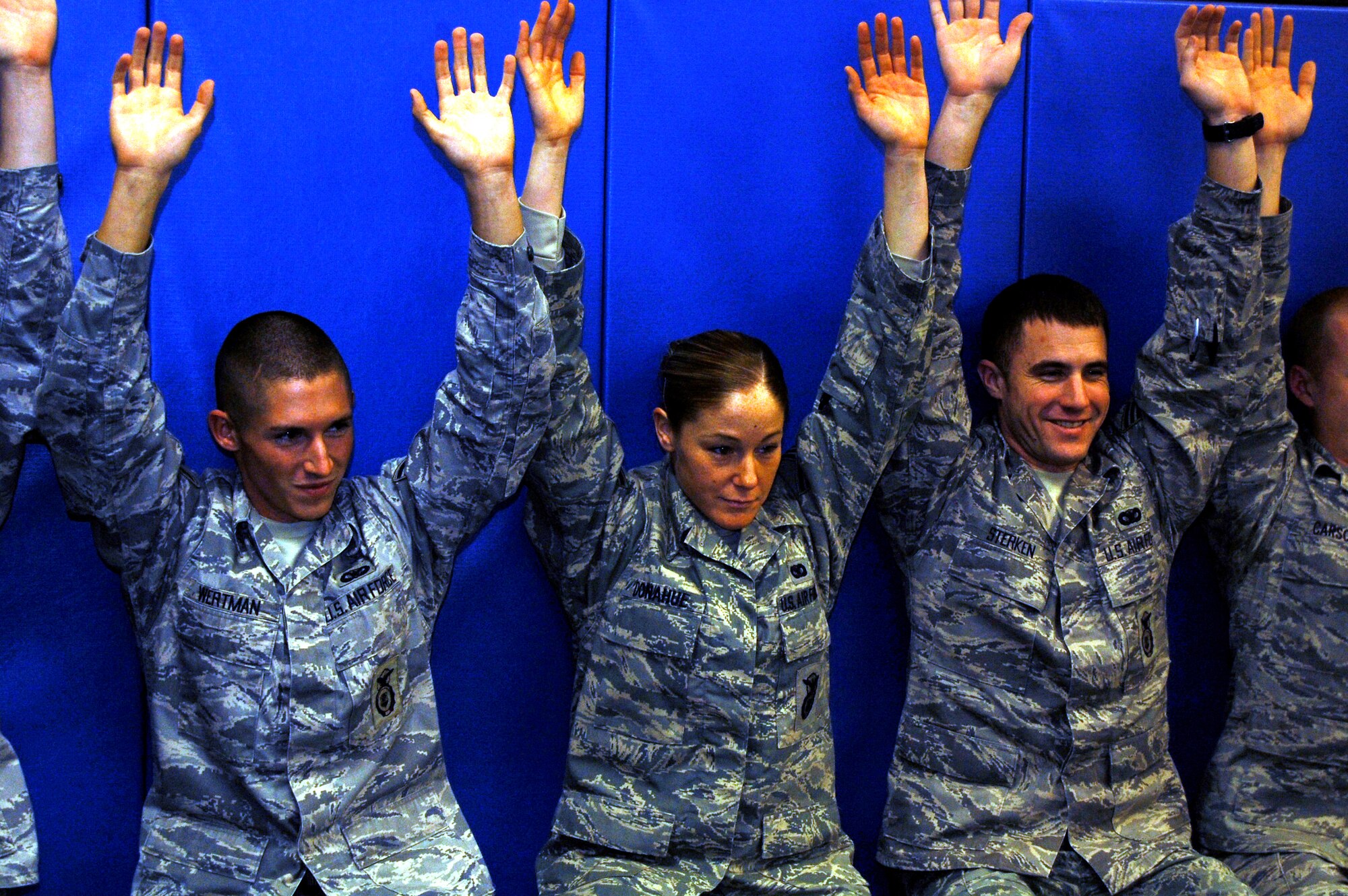 Students in the Air Force Phoenix Raven Training Course participate in a physical training session on Feb. 19, 2009, in the U.S. Air Force Expeditionary Center on Fort Dix, N.J.  The Raven course, taught by the USAF EC's 421st Combat Training Squadron, teaches security forces Airmen specialized training in aircraft security, combatives and verbal judo to name a few.  (U.S. Air Force Photo/Tech. Sgt. Scott T. Sturkol)