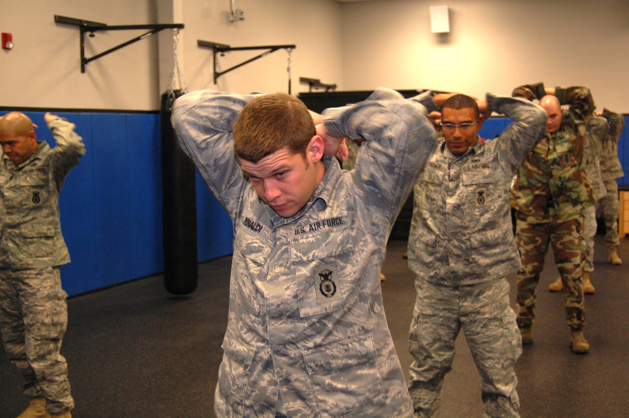 Students in the Air Force Phoenix Raven Training Course participate in a physical training session on Feb. 19, 2009, in the U.S. Air Force Expeditionary Center on Fort Dix, N.J.  The Raven course, taught by the USAF EC's 421st Combat Training Squadron, teaches security forces Airmen specialized training in aircraft security, combatives and verbal judo to name a few.  (U.S. Air Force Photo/Tech. Sgt. Scott T. Sturkol)