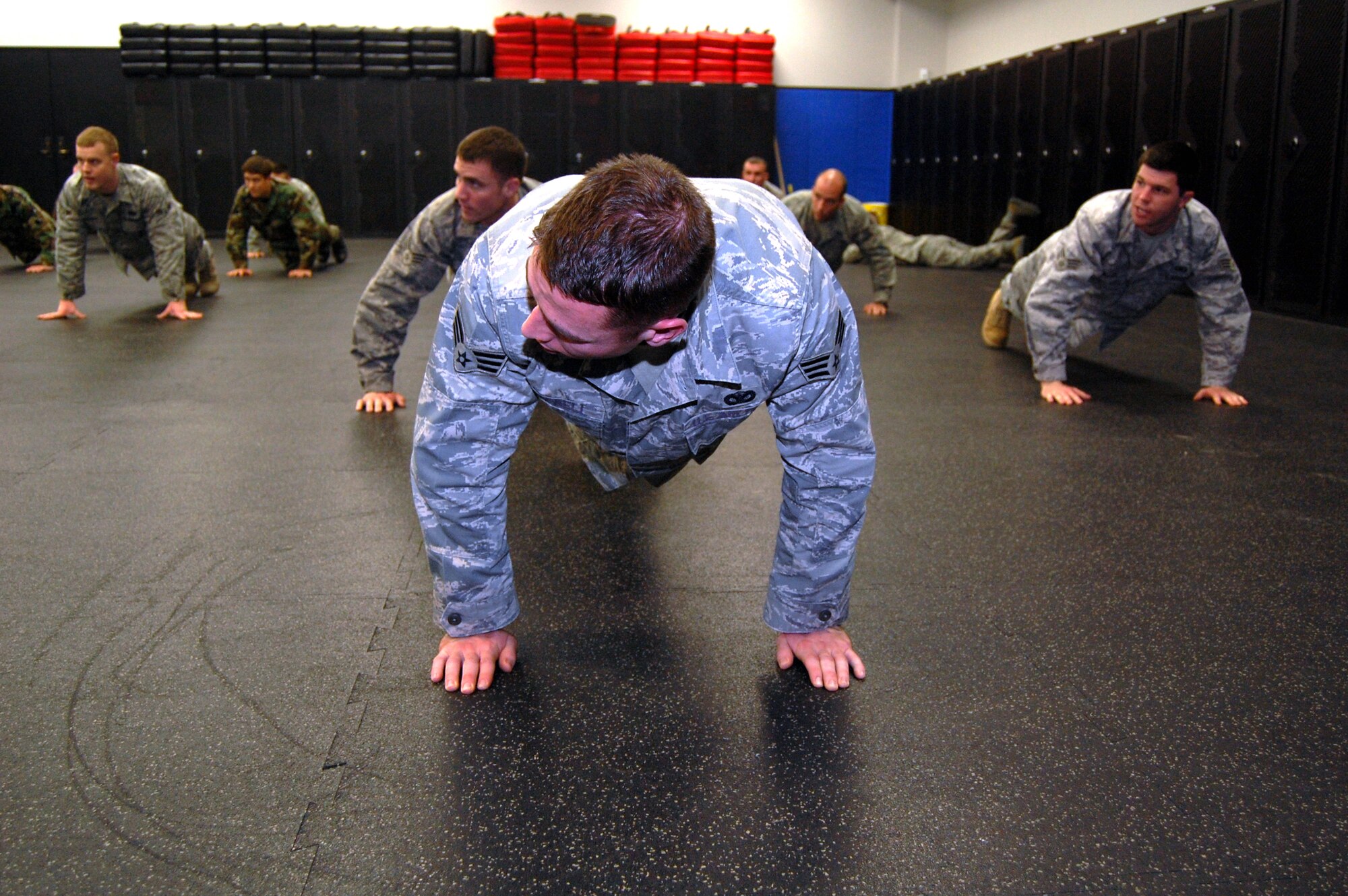 Students in the Air Force Phoenix Raven Training Course participate in a physical training session on Feb. 19, 2009, in the U.S. Air Force Expeditionary Center on Fort Dix, N.J.  The Raven course, taught by the USAF EC's 421st Combat Training Squadron, teaches security forces Airmen specialized training in aircraft security, combatives and verbal judo to name a few.  (U.S. Air Force Photo/Tech. Sgt. Scott T. Sturkol)