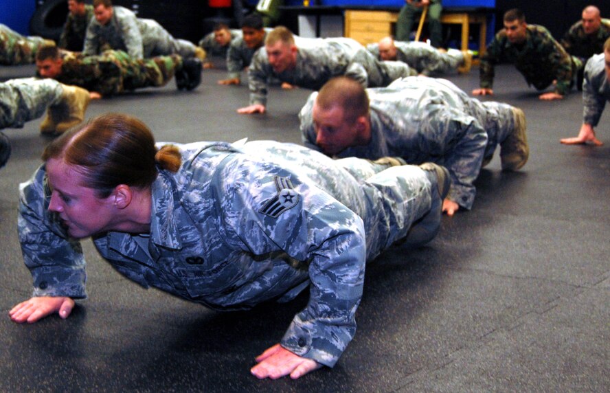 Students in the Air Force Phoenix Raven Training Course participate in a physical training session on Feb. 19, 2009, in the U.S. Air Force Expeditionary Center on Fort Dix, N.J.  The Raven course, taught by the USAF EC's 421st Combat Training Squadron, teaches security forces Airmen specialized training in aircraft security, combatives and verbal judo to name a few.  (U.S. Air Force Photo/Tech. Sgt. Scott T. Sturkol)