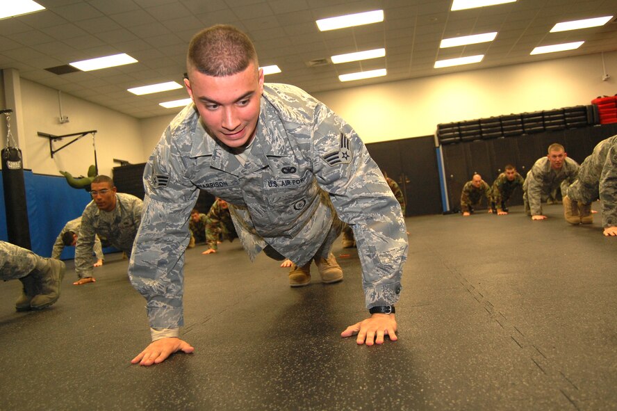 Students in the Air Force Phoenix Raven Training Course participate in a physical training session on Feb. 19, 2009, in the U.S. Air Force Expeditionary Center on Fort Dix, N.J.  The Raven course, taught by the USAF EC's 421st Combat Training Squadron, teaches security forces Airmen specialized training in aircraft security, combatives and verbal judo to name a few.  (U.S. Air Force Photo/Tech. Sgt. Scott T. Sturkol)