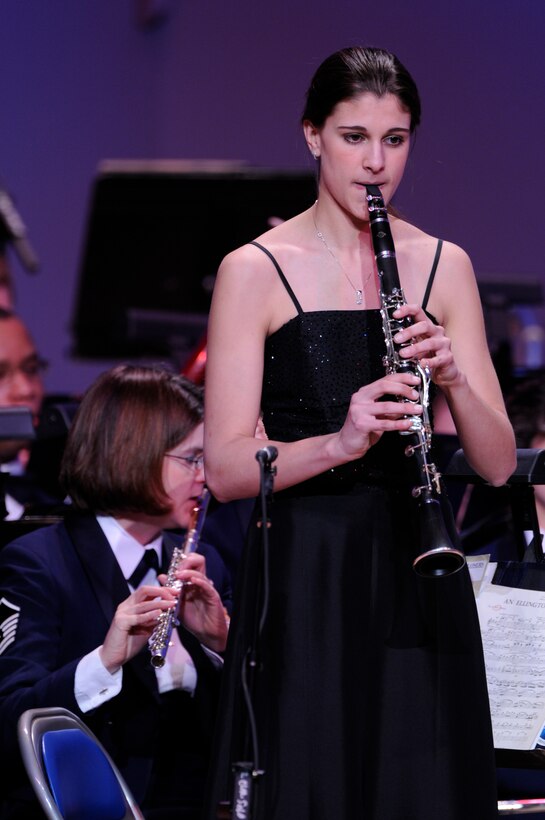 Katherine Kohler, the Col. George S. Howard young artist competition winner, performs with the Air Force Band during their first guest artist series concert of the year at Daughters of the American Revolution Constitution Hall Feb. 22. Charley Pride was the performing artist with Bernie Lucas, host of America’s Music on 98.7 WMZQ, as the guest emcee. (U.S. Air Force photo by Staff Sgt. Dan DeCook)