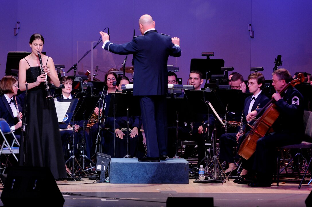 Katherine Kohler, the Col. George S. Howard young artist competition winner, performs with the Air Force Band during their first guest artist series concert of the year at Daughters of the American Revolution Constitution Hall Feb. 22. Charley Pride was the performing artist with Bernie Lucas, host of America’s Music on 98.7 WMZQ, as the guest emcee. (U.S. Air Force photo by Staff Sgt. Dan DeCook)