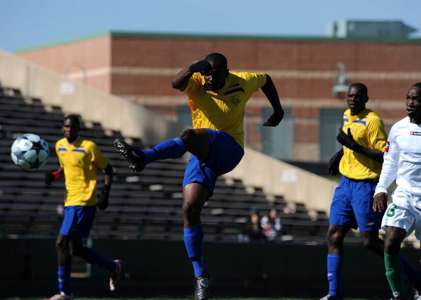 ABILENE, Texas - Barbados (yellow) competes in the second day of the CISM tournament against Suriname at Shotwell Stadium here, Feb. 22. Barbados won the game 3-2. Also that day the United States defeated Canada 2-1.(U.S. Air Force photo by Airman 1st Class Stephen Reyes) 