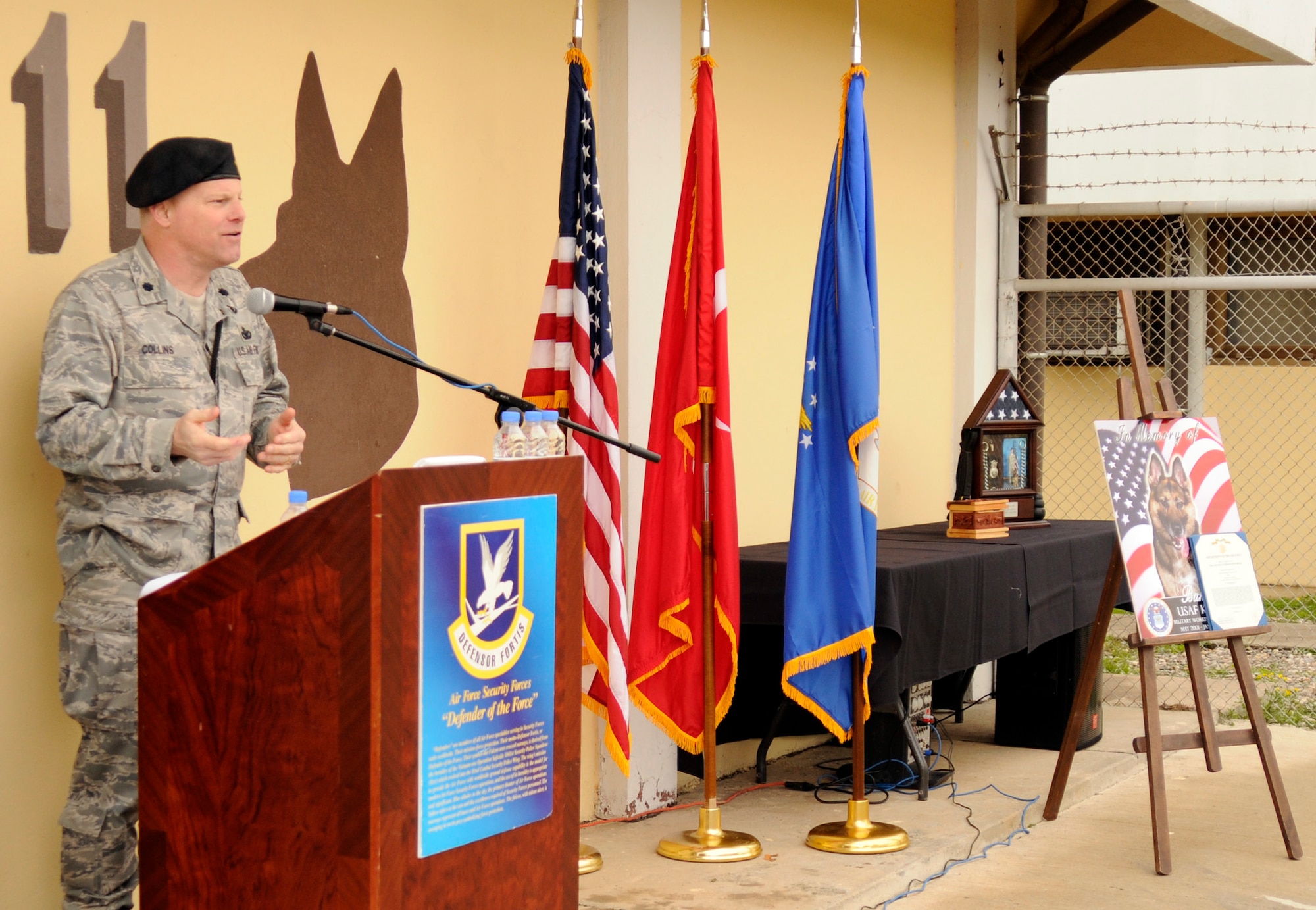 Lt. Col. James Collins, 39th Security Forces commander, speaks to the crowd Feb. 20 during the military working dog memorial ceremony held at the 39 SFS K-9 kennels.  The ceremony was held for MWD Bak, who passed Jan. 27 after more than five years of service as a patrol/explosive detector dog at Incirlik.  Bak’s handler was Staff Sgt. Chris Smith, 39 SFS MWD handler. (U.S. Air Force photo by Airman 1st Class Amber Russell)