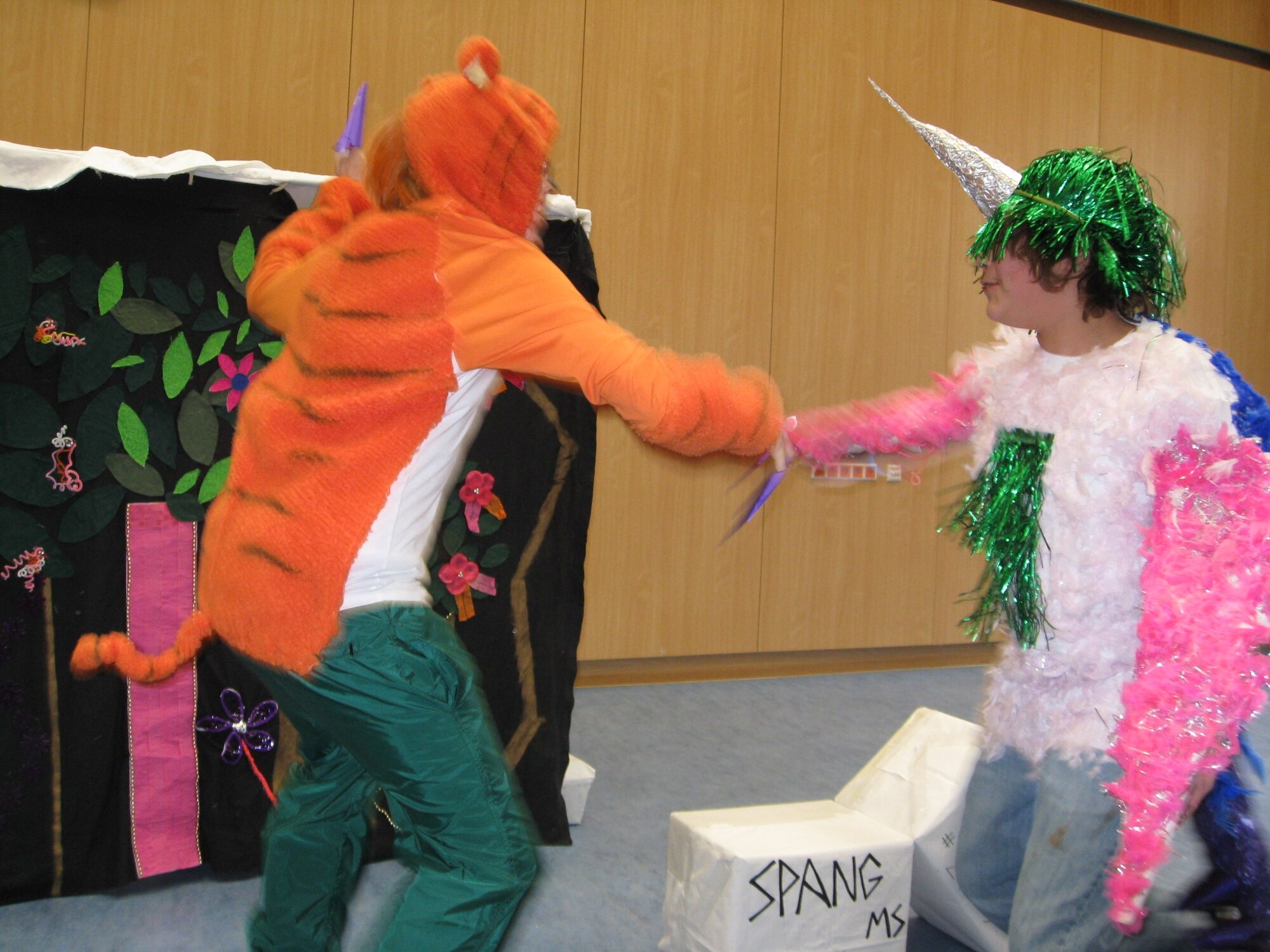 LANDSTUHL, Germany – Paul Naisbitt, playing Kanger, fights fellow mythological character TJ Trottier, playing Ribacahoo, the protector of the Latienapay Forest Feb. 21, 2009. Kanger is trying to help Heracles perform the Lost Labor, to do so he must obtain wings from Ribacahoo. Paul is the son of Shelly and Lt. Col. Dave Naisbitt, 606th Air Control Squadron. TJ is the son of Valerie and Tech. Sgt. Terry Trottier, 52nd Civil Engineer Squadron. (U.S. Air Force photo by April Goetz)