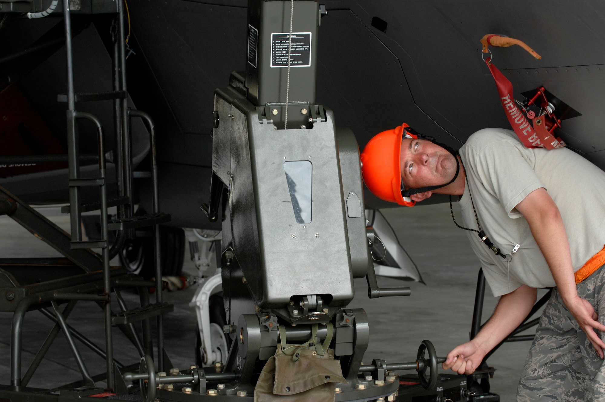 Staff Sgt. Terry Vickery operates an east- west hoist during installation of an F-22 canopy Feb. 18 at Andersen Air Force Base, Guam. The Raptors are deployed from Elmendorf Air Force Base, Alaska, to Guam for three months as the Pacific’s Theater Security Package. The stealth-fighters, along with associated maintenance and support personnel, comprise the 90th Fighter Squadron and will participate in various exercises that provide routine training in an environment different from their home station. Sgt. Vickery is an egress technician deployed from Elmendorf AFB and assigned to 36th Expeditionary Maintenance Squadron.


(U.S. Air Force photo/ Master Sgt. Kevin J. Gruenwald) released

