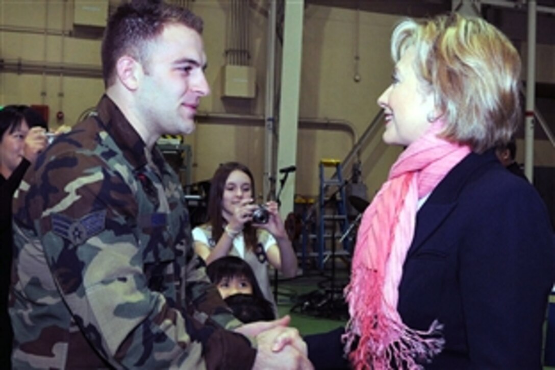 Secretary of State Hillary Rodham Clinton greets military members and their families on Yokota Air Base, Japan, Feb. 22, 2009. Clinton stopped on the base after completing her first trip as secretary of state.