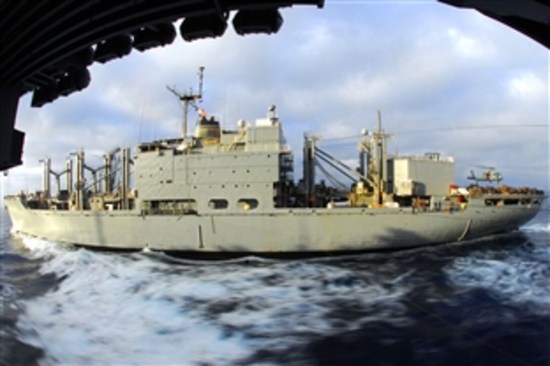The combat stores ship USNS San Jose conducts a replenishment at sea with the aircraft carrier USS John C. Stennis under way in the Pacific Ocean, Feb. 23, 2009. The USS John C. Stennis and Carrier Air Wing 9 are on a scheduled six-month deployment to the western Pacific Ocean.