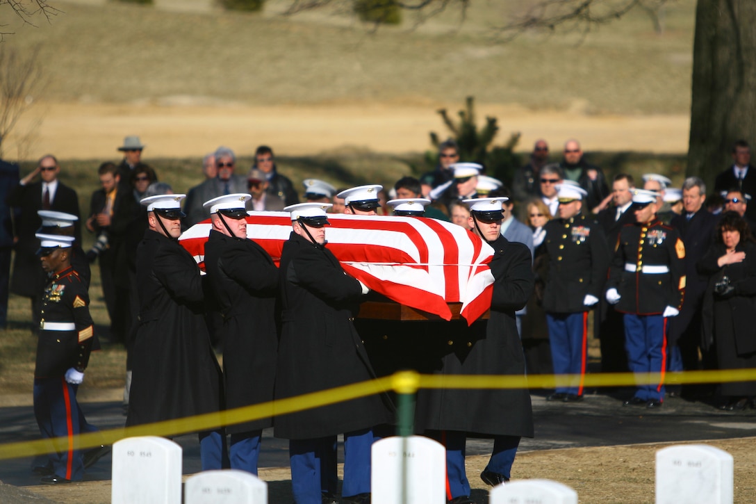 U.S. Marine Corps Body Bearers, Marine Barracks Washington, transport the remains of Marine Sgt. Trevor Johnson to his final resting place at Arlington National Cemetery in Arlington, Va., Feb. 24.