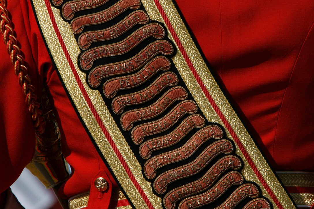 Master Gunnery Sgt. Mark Miller, drum major for the U.S. Marine Corps' Drum and Bugle Corps, wears a baldric embroidered with the Marine Corps' battle honors during a performance Feb. 24, 2009, at the Marine Corps Air Station in Yuma, Ariz. The performance marked the beginning of the band's annual tour. For approximately the last 20 years, the Drum and Bugle Corps' has trained annually in Yuma before beginning touring. Miller, the 20th drum major of "The Commandant's Own," is a native of Salisbury, Md.