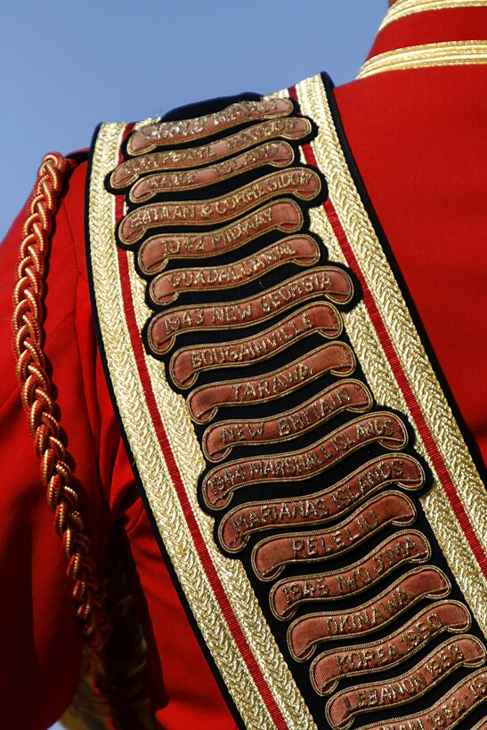 Master Gunnery Sgt. Mark Miller, drum major for the U.S. Marine Corps' Drum and Bugle Corps, wears a baldric embroidered with the Marine Corps' battle honors during a performance Feb. 24, 2009, at the Marine Corps Air Station in Yuma, Ariz. The performance marked the beginning of the band's annual tour. For approximately the last 20 years, the Drum and Bugle Corps' has trained annually in Yuma before beginning touring. Miller, the 20th drum major of "The Commandant's Own," is a native of Salisbury, Md.