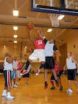 The 12th Medical Group intramural basketball team beat the 12th Communications Squadron team 53-24 at the Rambler Fitness Center on Feb. 25. (U.S. Air Force photo by Staff Sgt. Tim Bazar)