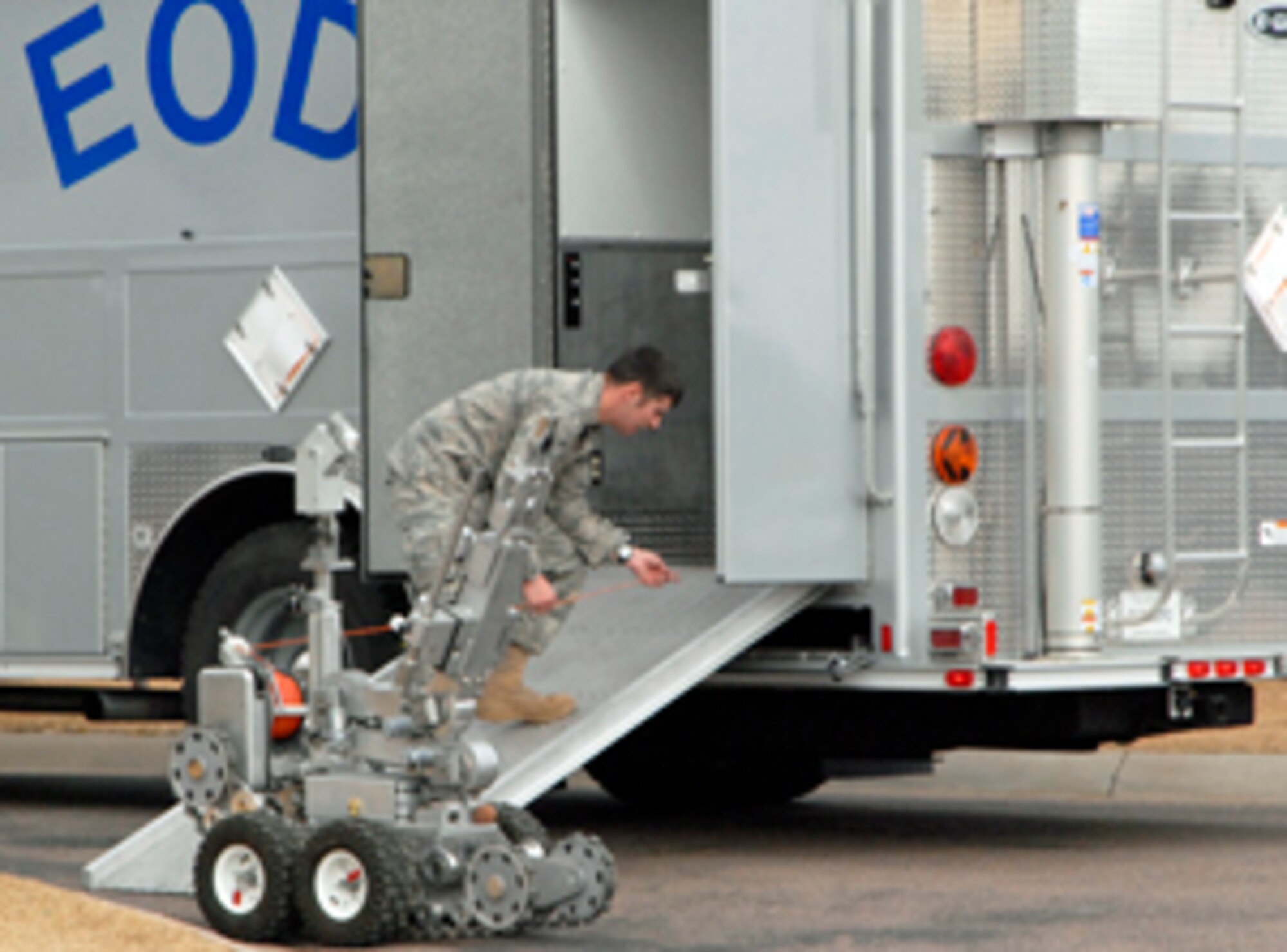 Airman 1st Class Achiel Pype, 21st Explosive Ordnance Disposal flight, readies the flight’s robot during a response to a Condor Crest exercise scenario. The exercise, held Feb. 9 to 12, is designed to test how the wing responds to emergent situations in order to sharpen installation protection and hone warrior skills. Airman Pype is an EOD apprentice with the detachment. (U.S. Air Force photo by Dennis Howk)