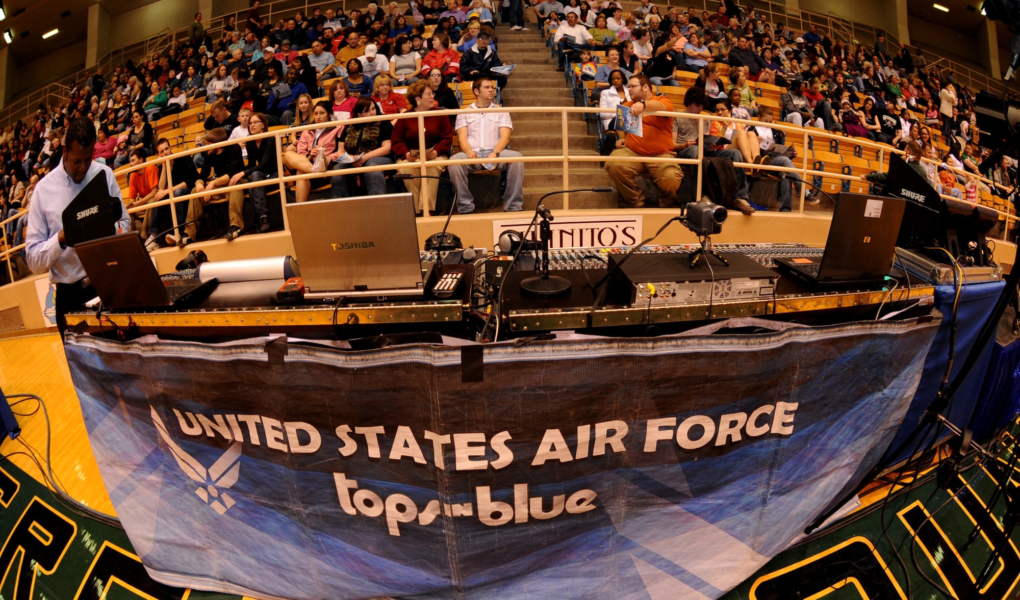 CANNON AIR FORCE BASE, N.M. -- An audience waits for the musical set of "Deja Blue" to begin during the Tops in Blue 2008 World Tour performance at Greyhound Arena, in Portales, N.M., Feb. 23. Tops in Blue performers entertain Airmen and communities worldwide and have only a few more performances remaining in their 2008 tour. (U.S. Air Force photo/Airman 1st Class Evelyn Chavez)