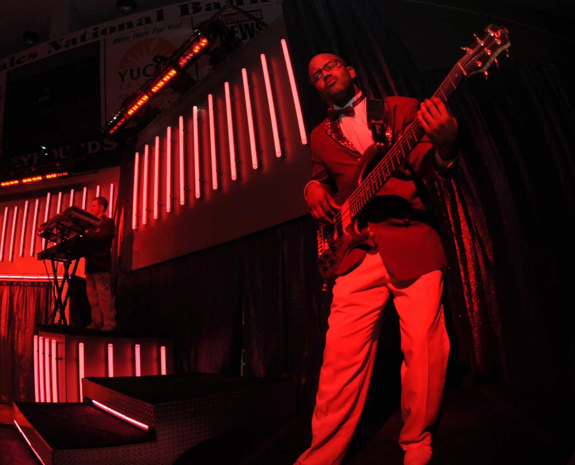 CANNON AIR FORCE BASE, N.M. -- Airman 1st Class Henry Roberson, of the 324th Intelligence Squadron at Hickam Air Force Base, Hawaii, belts out a guitar solo during the Tops in Blue 2008 "Deja Blue" World Tour performance at Greyhound Arena, in Portales, N.M., Feb. 23. Tops in Blue performers entertain Airmen and communities worldwide and their Portales performance was one of the final shows in their 2008 tour. (U.S. Air Force photo/Airman 1st Class Evelyn Chavez)