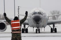 OFFUTT AIR FORCE BASE, Neb. -- SrA Robert K. Brushel, US Air Force, a crew chief for the 55th Aircraft Maintenance Squadron based at Offutt AFB, Nebraska, marshals a RC-135 aircraft beginning to taxi away from the Alpha 3 operational apron on February 6th, 2008.  The simulated deployment and aircraft generation are a major part of Operational Readiness Inspection, Coronet White, which serves to test the ability of Offutt personnel to conduct a short notice deployment.  The Air Combat Command Inspector General is conducting a Phase 1 Operational Readiness Inspection, Coronet White 08 ACC-13, of the 55th Wing's tasked units from Feb 4 thru Feb 9, 2008. 

 US Air Force photo by Daniel J. Rohan Jr. 