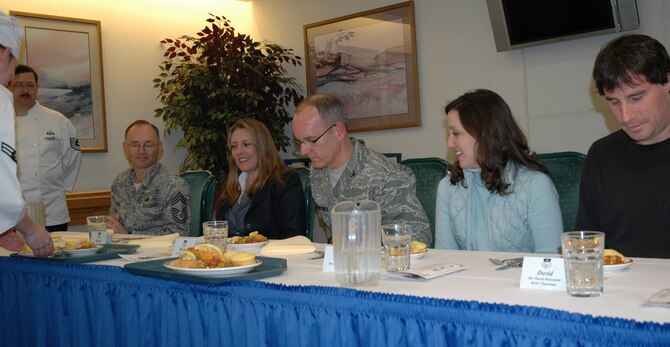 The judges take a careful look at the first dish presented to them during the annual Warrior Chef competition Feb. 19 at the Elkhorn Dining Facility. From left are Chief Master Sgt. Michael David, 341st Mission Support Group; Mrs. Karen and Col. Michael Fortney, 341st Missile Wing commander; Mrs. Doni and Mr. David Weissman, Military Affairs Committee chairman. (U.S. Air Force photo/Valerie Mullett)