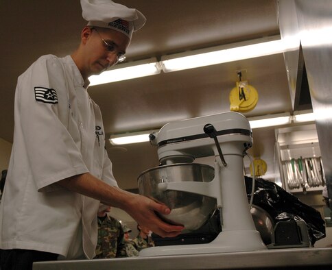 Staff Sgt. Jeffrey Kaplan, 12 Missile Squadron chef, prepares a batter for a touille during the annual Warrior Chef competition at the Elkhorn Dining Facility Feb. 19. He and his partner, Senior Airman David Harris, were the third quarter winners of the 2008 competition. (U.S. Air Force photo/Valerie Mullett)