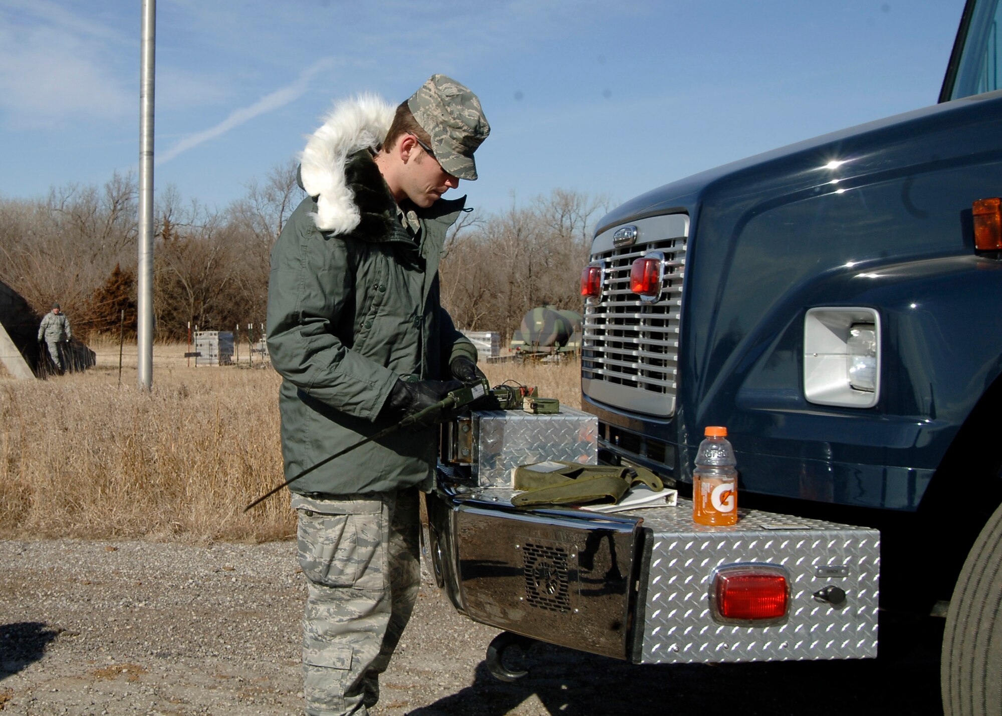 MCCONNELL AIR FORCE BASE, Kan. -- Airman 1st Class Graham Horner, 22nd Civil Engineer Squadron explosive ordnance disposal technician, prepares a C-4 detonator for an explosives exercise. The MX22 detonator has to be wired and prepped for the detonation process. (Photo by Senior Airman Anthony Mejia)