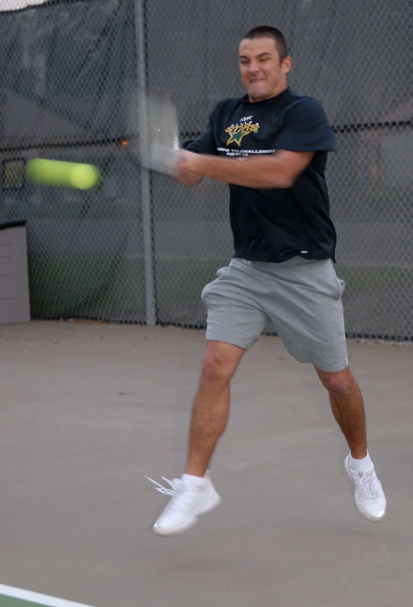 VANDENBERG AIR FORCE BASE, Calif. -- 2nd Lt. Joshua Print returns a serve during a tennis tournament sponsored by the base Fitness Center. The tournament was open to all active duty members and civillians. (U.S. Air Force photo/Airman 1st Class Antoinette Lyons)