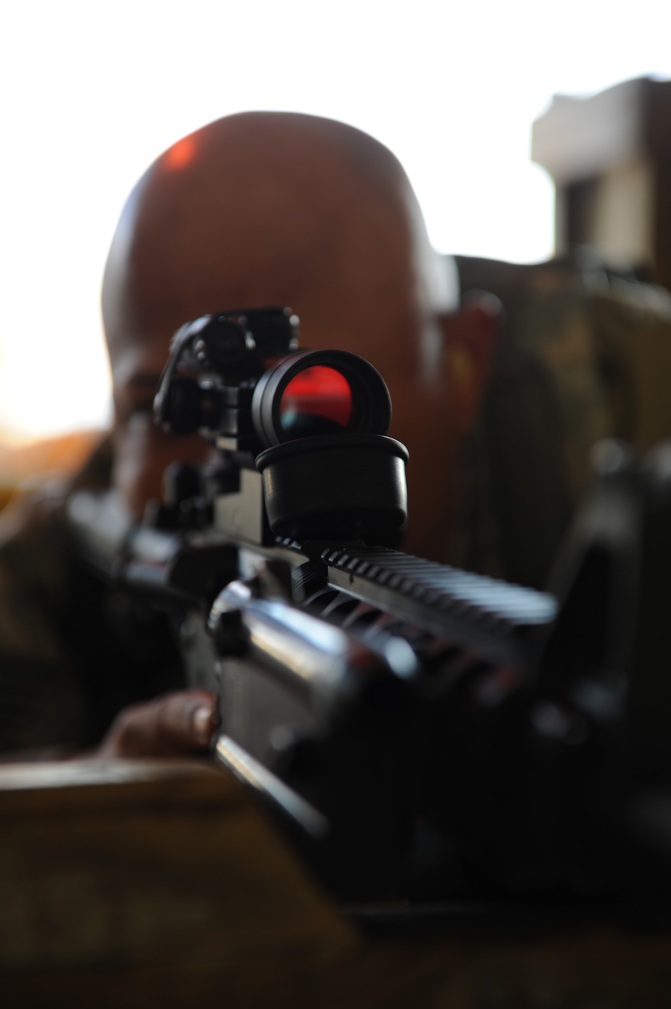WHITEMAN AIR FORCE BASE, Mo. - Tech. Sgt. Clifton Staples, 509th Security Forces Squadron, takes aim with an M-4 rifle during the Giant Sword II competition. Giant Sword II is a resurrection of Giant Sword, a Strategic Air Command Weapons Loading Competition held between 1958 - 1992. (U.S. Air Force photo/Airman 1st Class Carlin Leslie)