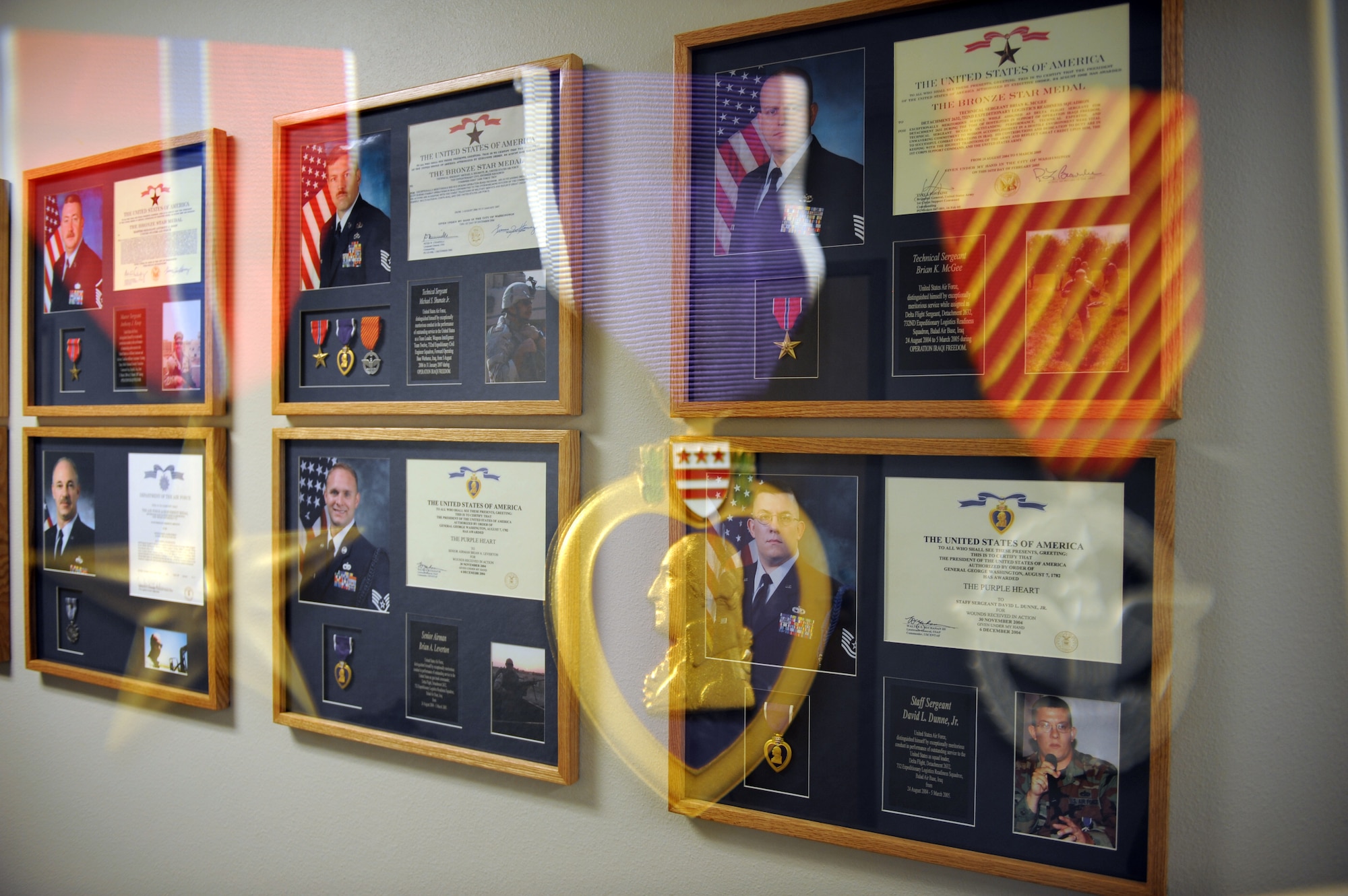 WHITEMAN AIR FORCE BASE, Mo. - The Heritage Wall in Whiteman's Professional Development Center displays airmen through chief master sergeants recognized for outstanding achievement, exceptionally meritorious service, actions of valor and wounds received in action. (U.S. Air Force photo/Staff Sgt. Charles Larkin)