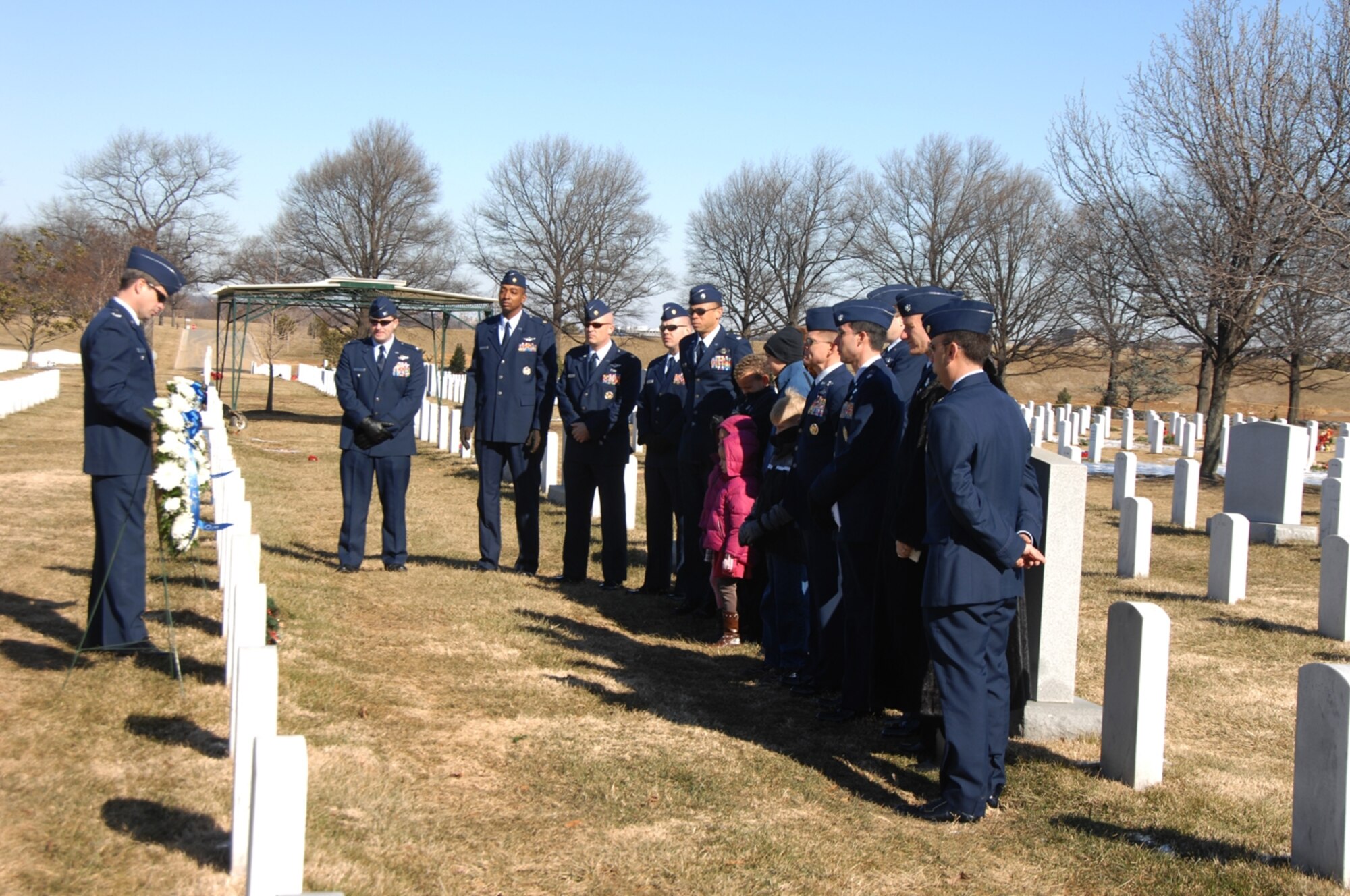 ARLINGTON NATIONAL CEMETERY- Col. Michael T. Plehn speaks to military members and their families  at a memorial service about the mission of the Spirit 03' crew the day they were shot down. (U. S. photo by Mr. Gary Black)

 

