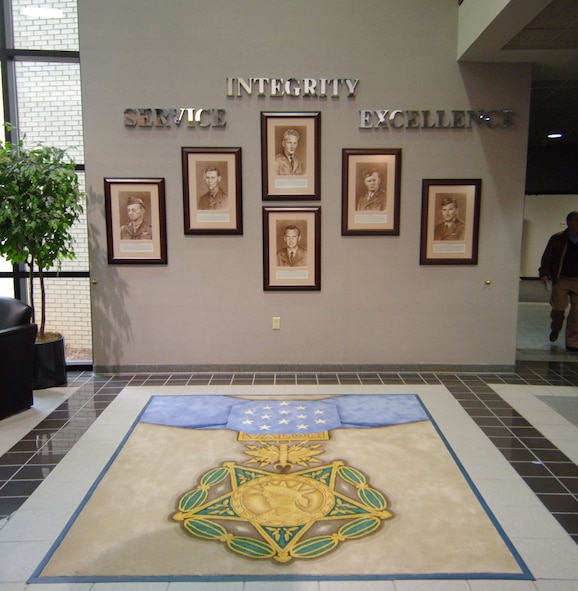 The new Medal of Honor display was dedicated in a ceremony at Gunter Annex's Senior NCO Academy on Tuesday. The display honors the six enlisted Airmen who received the award for their actions. (Air Force photo by Melanie Rodgers Cox)