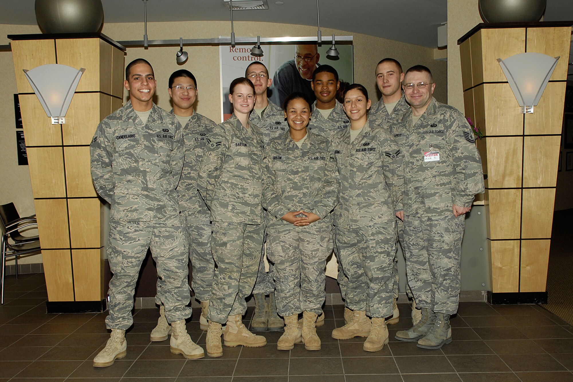 HANSCOM AIR FORCE BASE, Mass. – Hanscom’s First Term Airmen Center Course took place from Feb. 9-18. FTAC graduates of the course are front row (left to right), Airman First Class Jon Carlos Candelario, A1C Meagan Bartow, Airman Akia Austin, A1C Katherine Castano, course instructor Tech. Sgt. Mike Shimkus; second row (left to right) A1C Sarat Luewongopas, A1C Jason Britton, A1C Timothy Miller and A1C Richard Riggleman. The course is designed to help transition the Air Force's first term airmen from a training environment to the operational Air Force and highlight their responsibilities as new airmen.  (U.S. Air Force photo by Linda LaBonte Britt) 