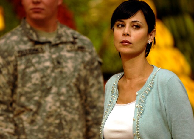 Catherine Bell prepares her self for a scene in an upcoming episode of the Lifetime television show "Army Wives" in the base commissary Feb 23. Miss Bell plays "Denise Sherwood" on the show. (U.S. Air Force photo/Senior Airman Timothy Taylor)