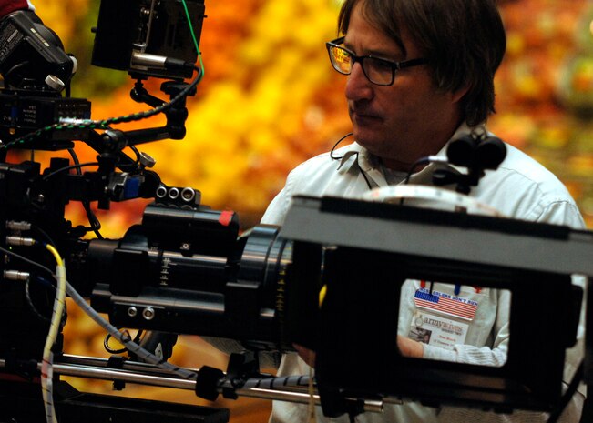 Tim Risch loads a new lens onto the camera to begin filming an upcoming episode of the Lifetime television show "Army Wives" at the base commissary Feb 23. In order to get a more authentic look the Department of Defense and base leadership has authorized filming at various locations. This is the second season the show has filmed here. (U.S. Air Force photo/Senior Airman Timothy Taylor)


