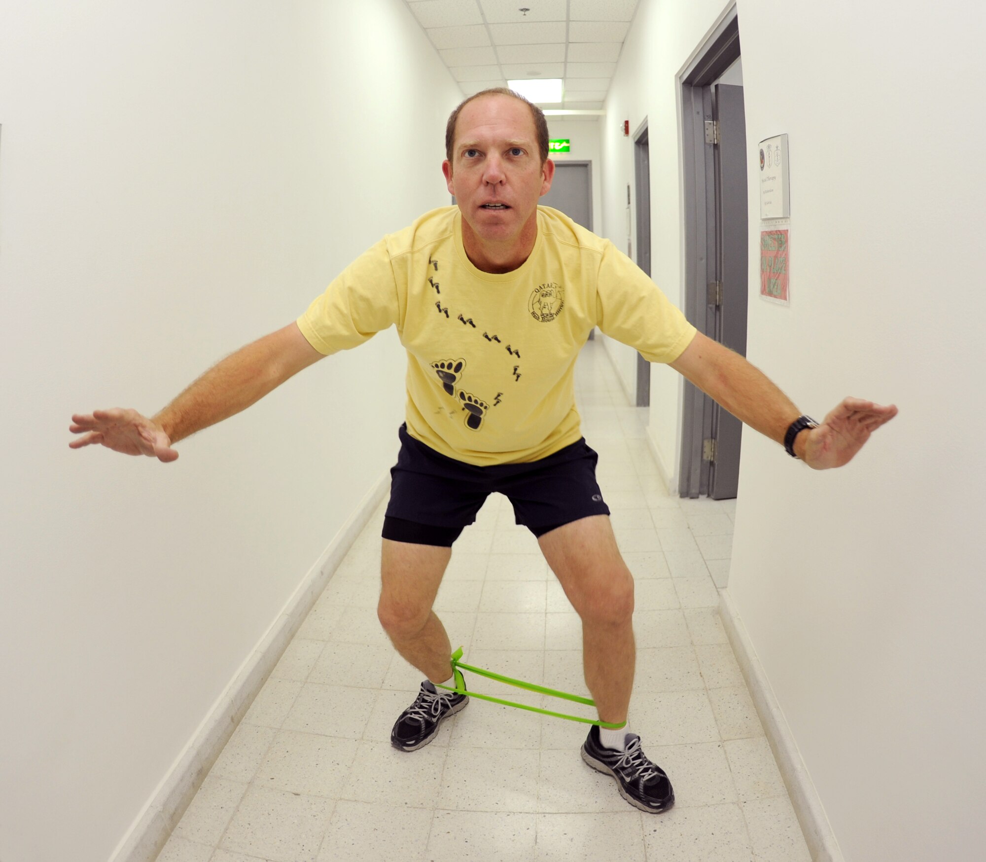 Randy Fort, Retired Navy Petty Officer 1st Class, performs a forward squat walk to help strengthen his legs after knee surgery, Feb. 24, 2009, at an undisclosed location in Southwest Asia.  Mr. Fort hails from Riverview, Fla., and is here in support of Operations Iraqi and Enduring Freedom and Combined Joint Task Force - Horn of Africa.  (U.S. Air Force Photo by Airman 1st Class Andrew Satran/Released)