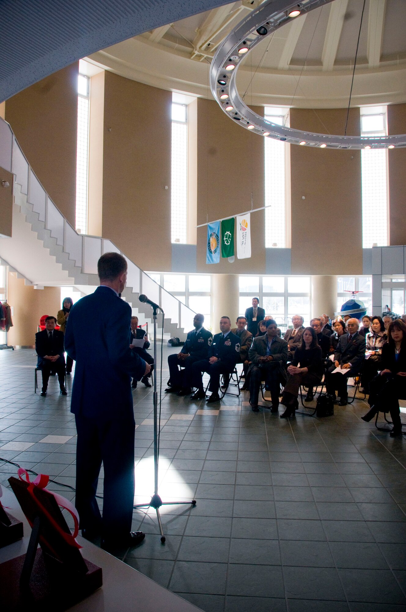 MISAWA CITY, Japan -- Col. David Stilwell, 35th Fighter Wing commander, delivers opening comments at the Red Feather Campaign check presentation ceremony at the Misawa International Center Feb. 23, 2009. Colonel Stilwell thanked the Airmen attending for their hard work and dedication to the local community. (U.S. Air Force photo by Staff Sgt. Samuel Morse)