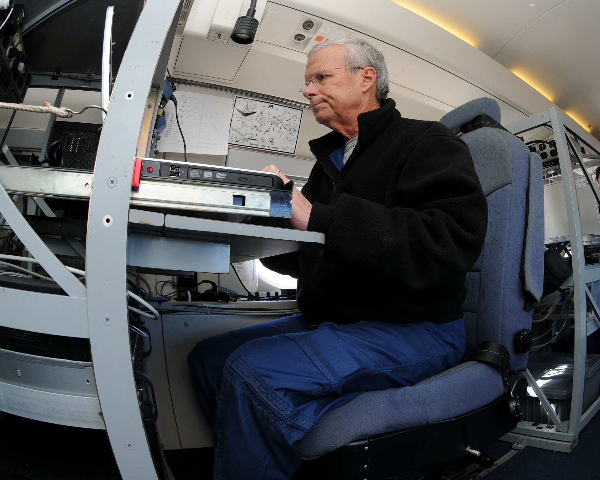 YOKOTA AIR BASE, Japan -- Jack Parish from the National Oceanic and Atmospheric Administration collects weather data Feb. 18 over the Pacific Ocean aboard a Gulfstream IV jet, known as "Gonzo." NOAA uses the state-of-the-art, high altitude research platform to better understand weather systems and allow people more time to react to heavy storms such as hurricanes, floods and tornadoes. Weather specialists flew several missions from Yokota over a two-month period in January and February to gather weather data over the Pacific. (U.S. Air Force photo/Airman 1st Class Michael Dillon)