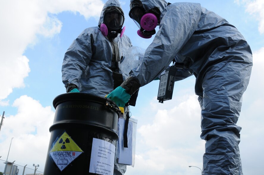An 18th Wing bio-hazard airmen responds to a simulated hazardous material spill on Kadena Air Base on Feb 26. This emergency management exercise honed Kadena's response capabilities. (U.S. Air Force photo/Airman 1st Class Amanda Grabiec)